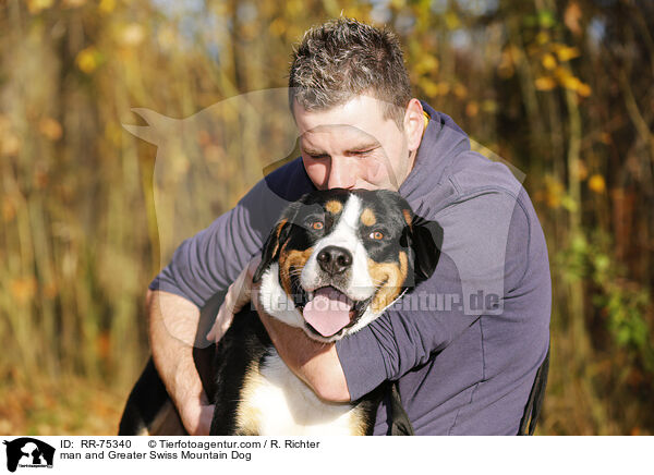 man and Greater Swiss Mountain Dog / RR-75340
