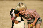 boy and Great Swiss Mountain Dog