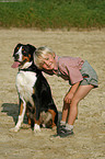 boy and Great Swiss Mountain Dog