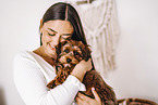 young woman with young havanese