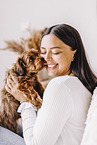 young woman with young havanese