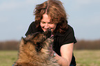 woman with Keeshond
