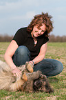woman with Keeshond