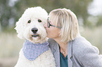 woman and Labradoodle