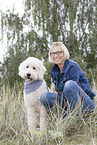 woman and Labradoodle