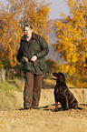 woman and Labrador Retriever