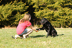 girl with Labrador Retriever