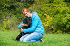 woman and Labrador Retriever