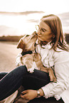 woman and Labrador Retriever Puppy