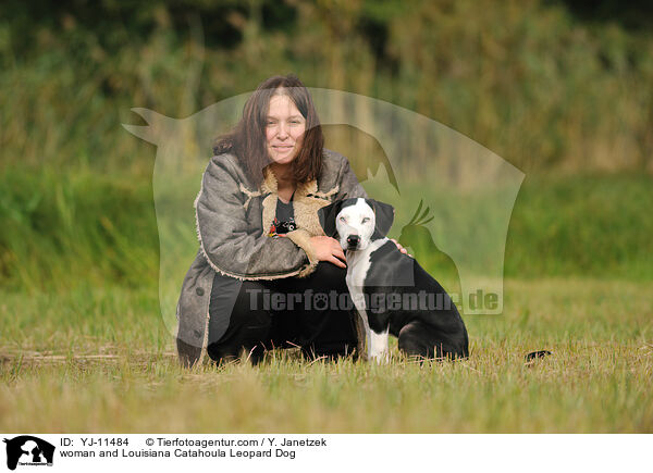 woman and Louisiana Catahoula Leopard Dog / YJ-11484