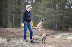young woman with Malinois