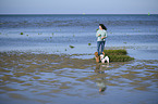 woman and 2 dogs