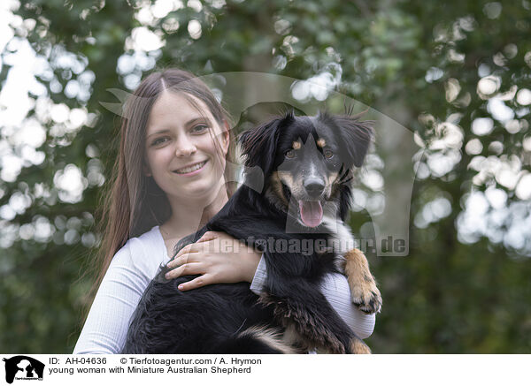 young woman with Miniature Australian Shepherd / AH-04636