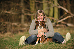 woman with Miniature Australian Shepherd