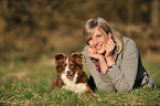 woman with Miniature Australian Shepherd