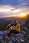 young woman with Miniature Australian Shepherd