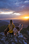 young woman with 2 Miniature Australian Shepherds