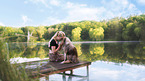 young woman with Miniature Australian Shepherd