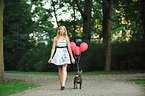 woman and Miniature Bull Terrier