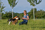 woman with 3 Dogs