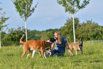 woman with 3 Dogs