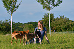 woman with 3 Dogs