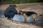 man and Old German Shepherd