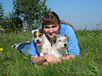 woman with 2 Parson Russell Terrier