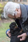 man and Petit Brabancon