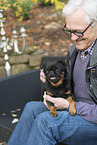 man and Petit Brabancon