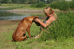 woman with Rhodesian Ridgeback