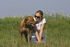 young woman with Rhodesian Ridgeback