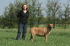 woman with Rhodesian Ridgeback