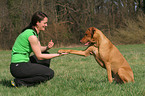 woman with Rhodesian Ridgeback