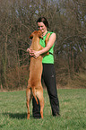 woman with Rhodesian Ridgeback