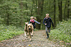 childs with Rhodesian Ridgebacks