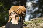 woman with Rhodesian Ridgeback