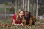 woman with Rhodesian Ridgeback