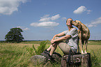 woman and Rhodesian Ridgeback