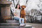 woman and Rhodesian Ridgeback