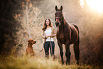 woman, Rhodesian Ridgeback and horse