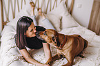 young woman with Rhodesian Ridgeback