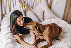 young woman with Rhodesian Ridgeback