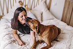 young woman with Rhodesian Ridgeback