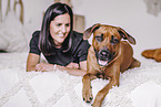 young woman with Rhodesian Ridgeback