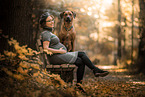 pregnant woman and Rhodesian Ridgeback