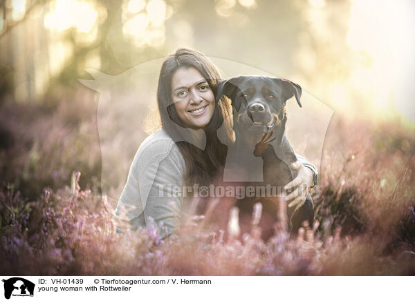 young woman with Rottweiler / VH-01439