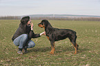 woman and Rottweiler