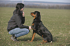 woman and Rottweiler