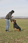 woman and Rottweiler